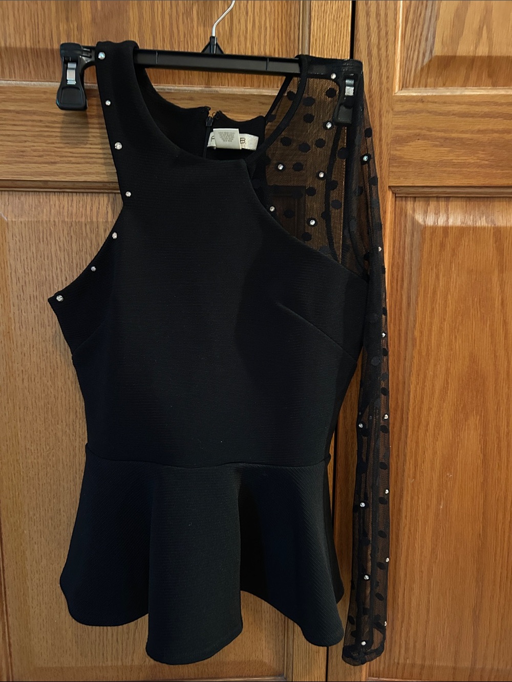 Arden B Black One-Shoulder Peplum Top with Sheer Polka Dot Sleeve